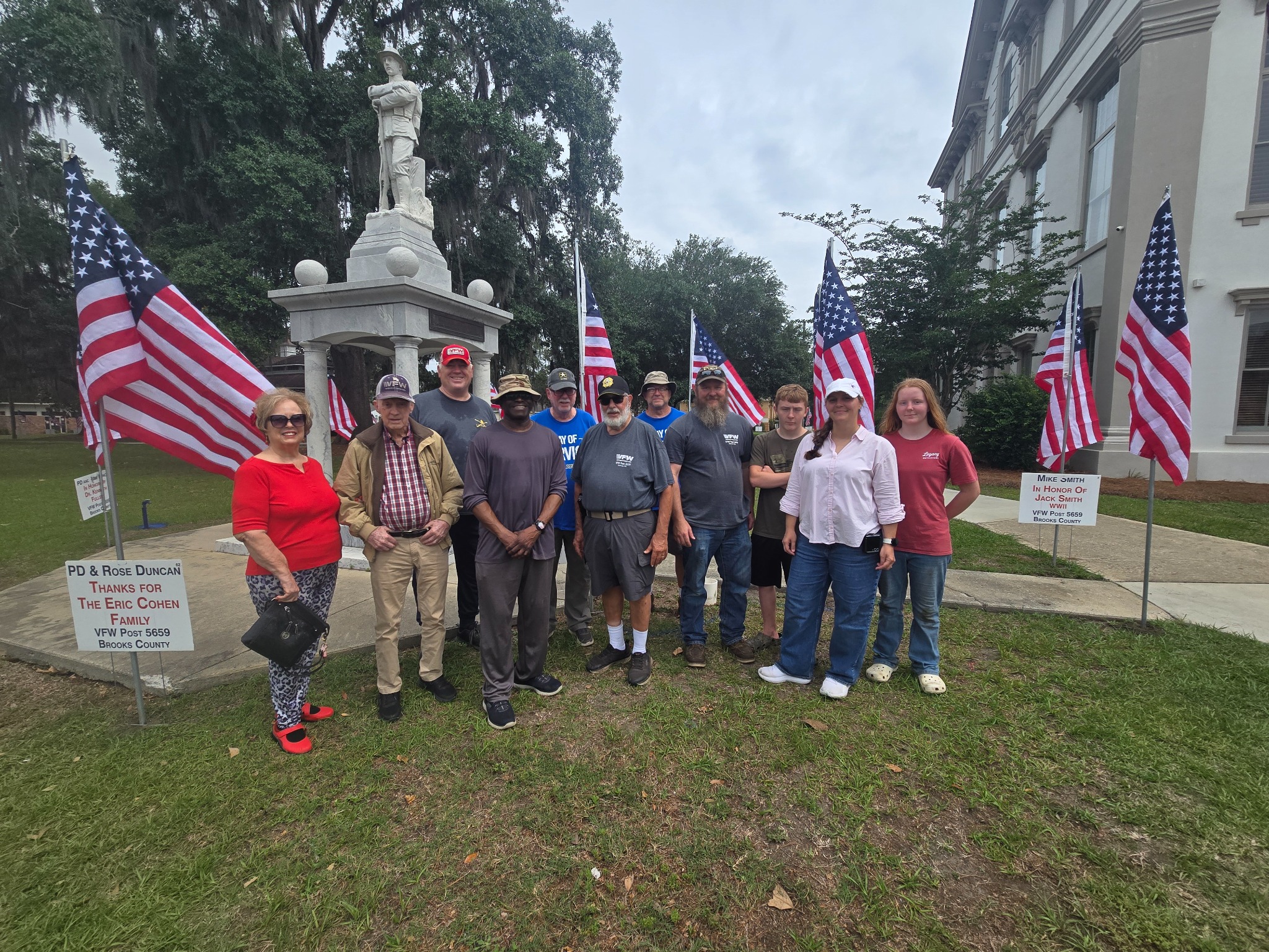 VFW Post 5659 members and volunteers at the Brooks County Courthouse flag display